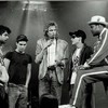 The Beastie Boys and Darryl 'D.M.C.' McDaniels with MTV VJ Adam Curry at center in 1988